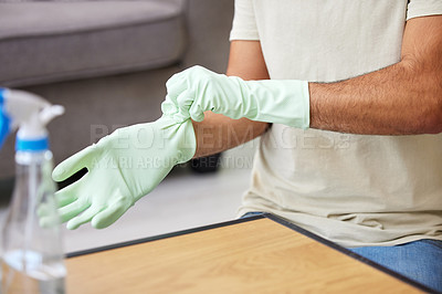 Buy stock photo Shot of an unrecognizable person cleaning a table at home