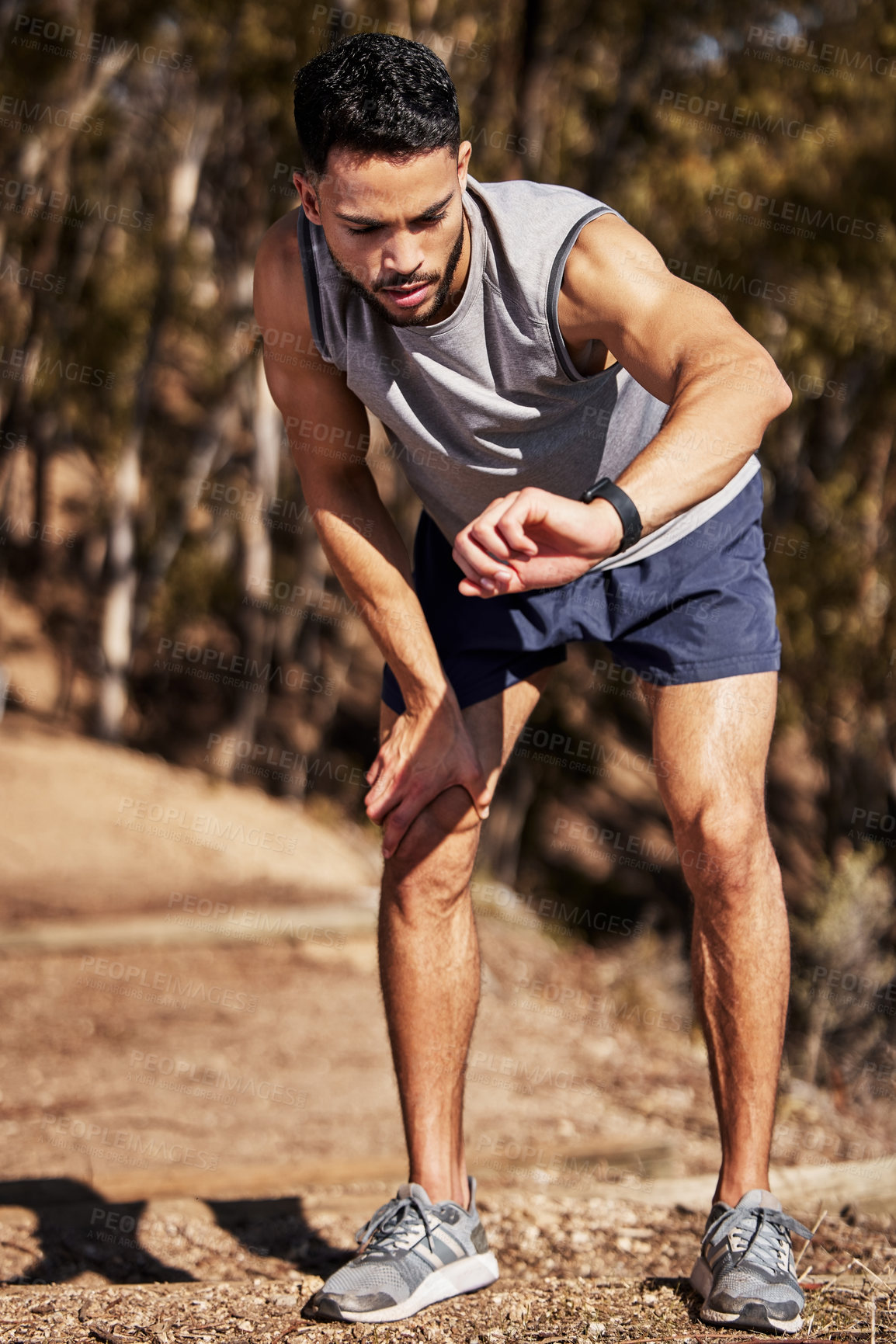 Buy stock photo Clock, time and man or runner outdoor for morning cardio, exercise and training for marathon or race. Male athlete, smart watch or stopwatch to track progress for workout, wellness and check results.