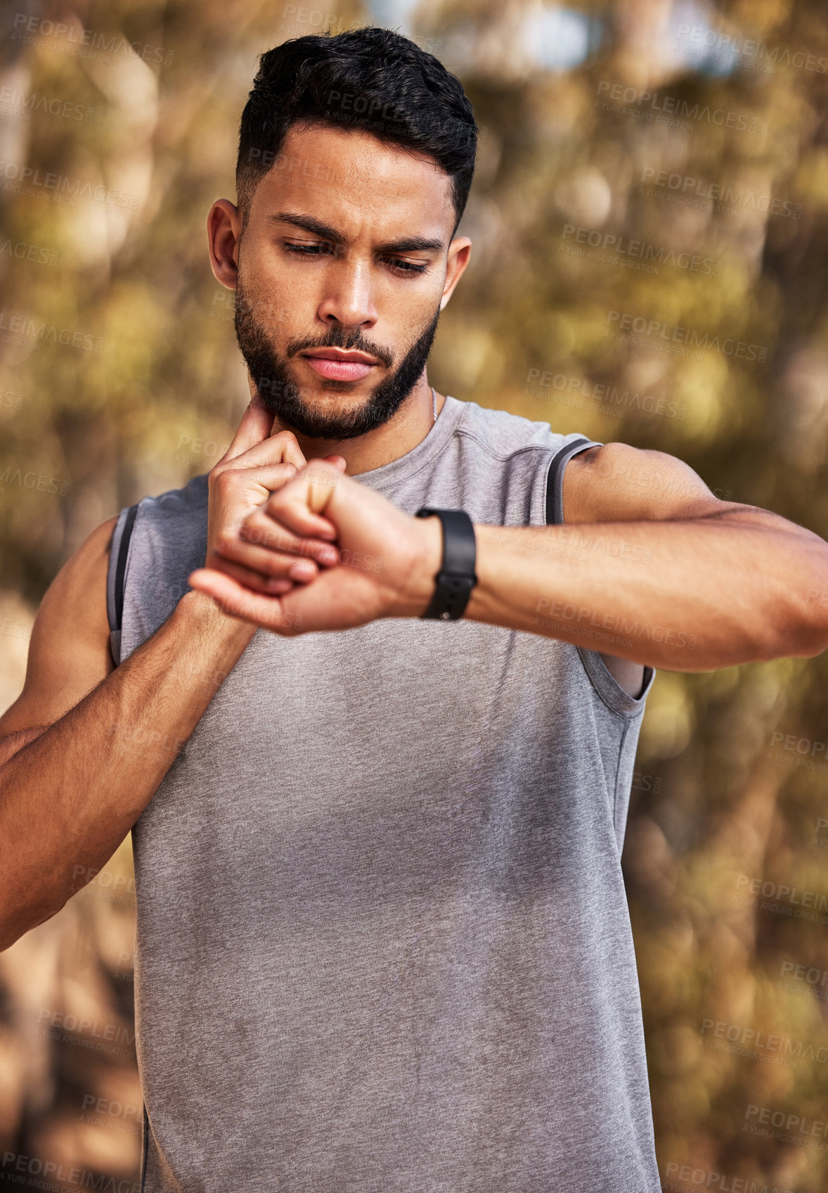 Buy stock photo Heart rate, check and man or runner outdoor for morning cardio, exercise and training for marathon or race. Male athlete, smart watch or stopwatch to track pulse for endurance, wellness and health.