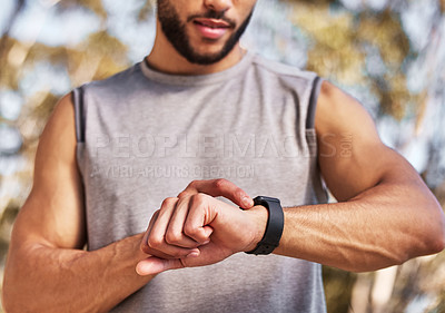 Buy stock photo Smart watch, hand and man or runner outdoor for morning cardio, exercise and training for marathon or race. Male athlete, wristwatch or stopwatch to track progress for workout or wellness and health.
