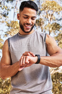Buy stock photo Smart watch, time and man happy outdoor for morning cardio, exercise and training for marathon or race. Male athlete, wristwatch or stopwatch to track progress for workout or wellness and health.