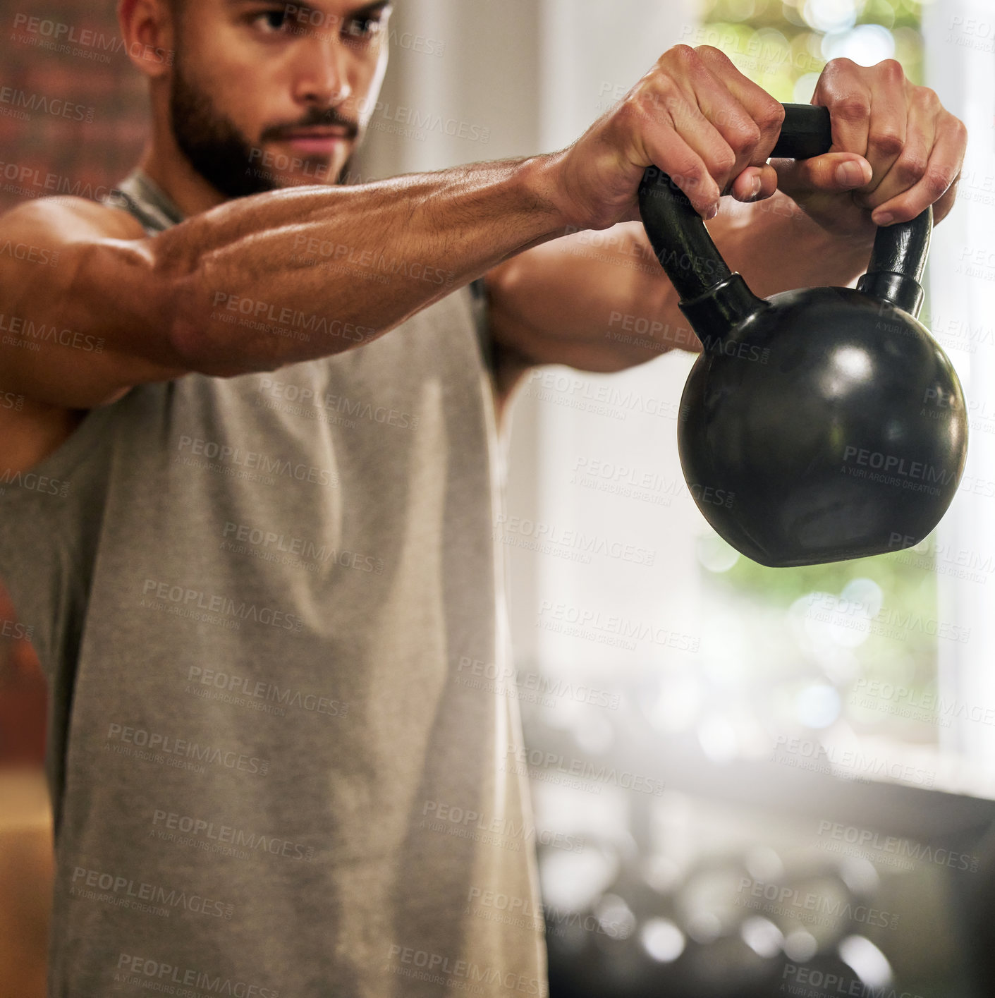 Buy stock photo Fitness, muscle and man with kettle bell in gym for exercise, bodybuilder training and workout. Sports, motivation and serious male person lifting weights for wellness, healthy body and strength