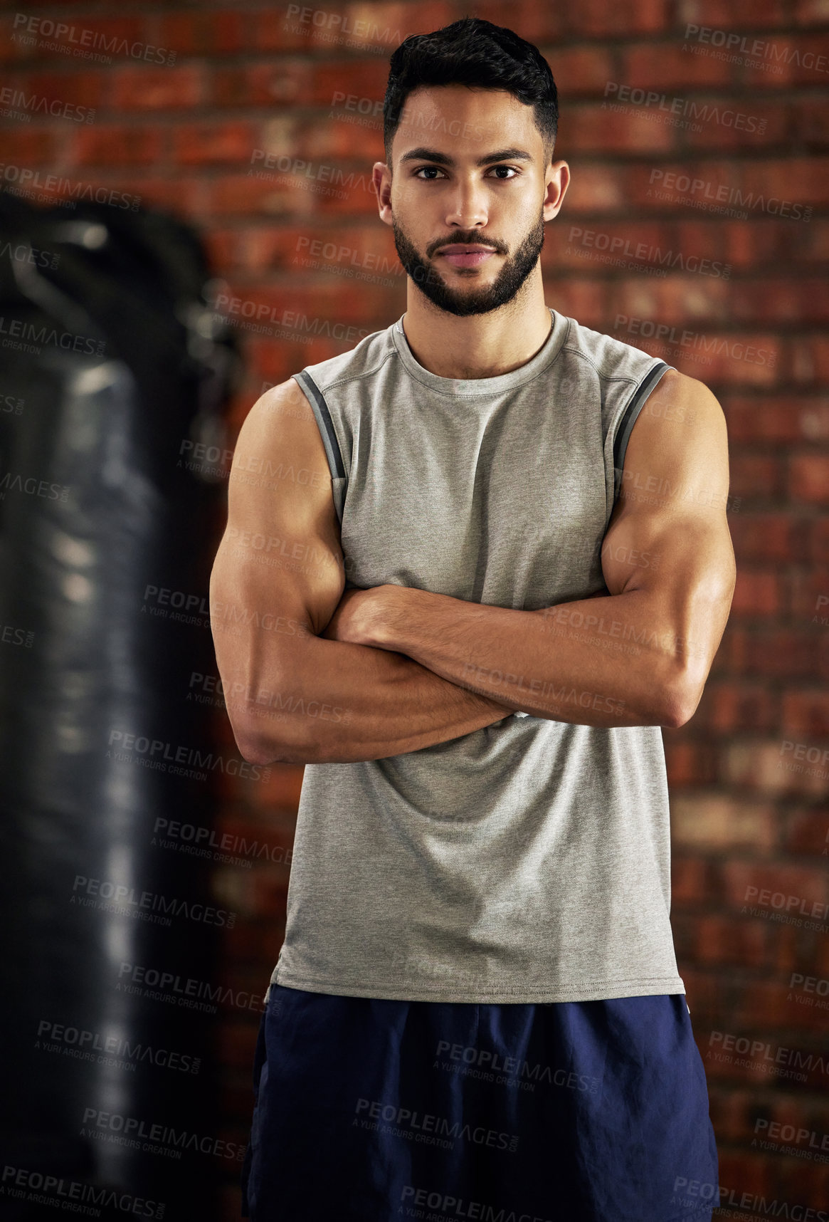 Buy stock photo Fitness, muscle and portrait of man in gym with arms crossed for confidence, motivation and pride. Exercise, workout and serious face of confident bodybuilder, personal trainer or sports club owner.