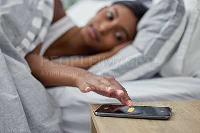 Buy stock photo Morning, woman in bed with phone alarm and time to wake up and getting ready for a fresh start of the new day. Sleep, wake and girl in bedroom with snooze on cellphone clock, swipe to rest and relax.