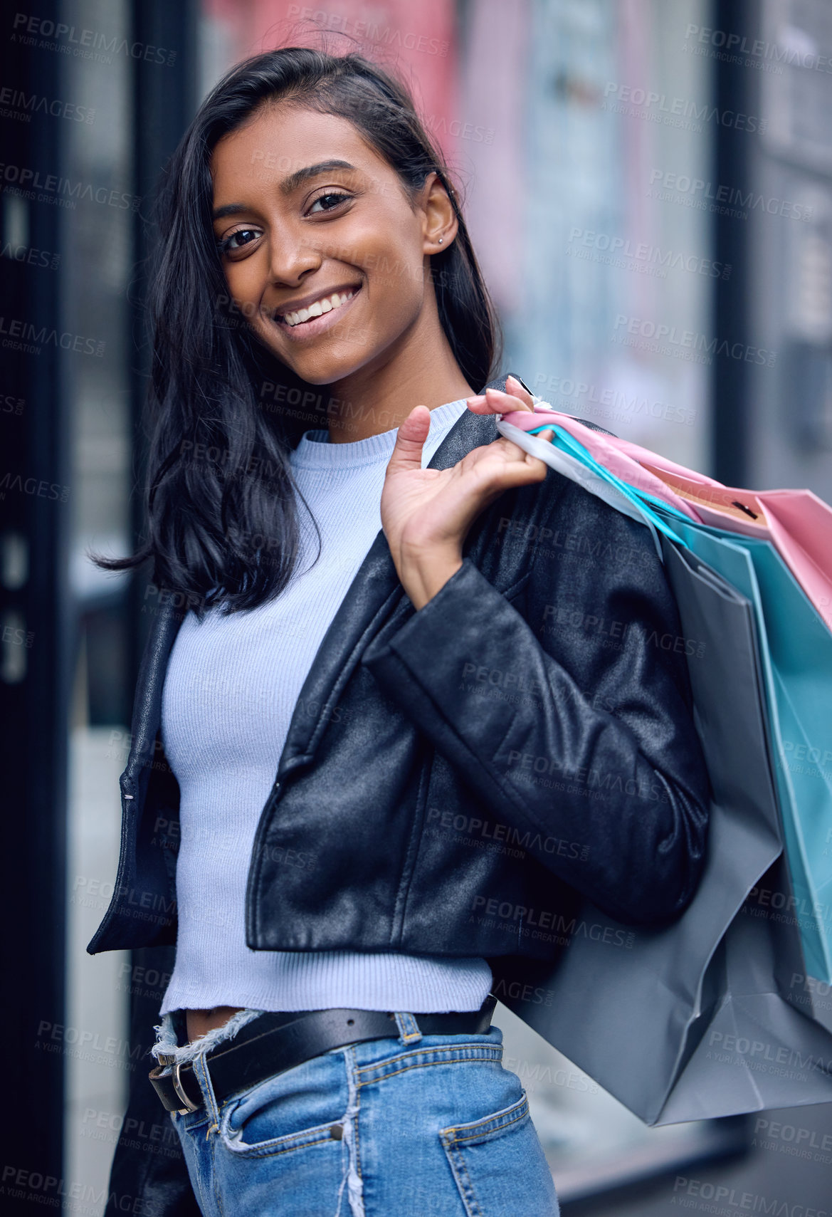 Buy stock photo Portrait, smile and woman with shopping bag in city at mall for fashion, sales and discount at retail store. Happy girl, clothes and gift in boutique for luxury, deal or rich Indian customer purchase