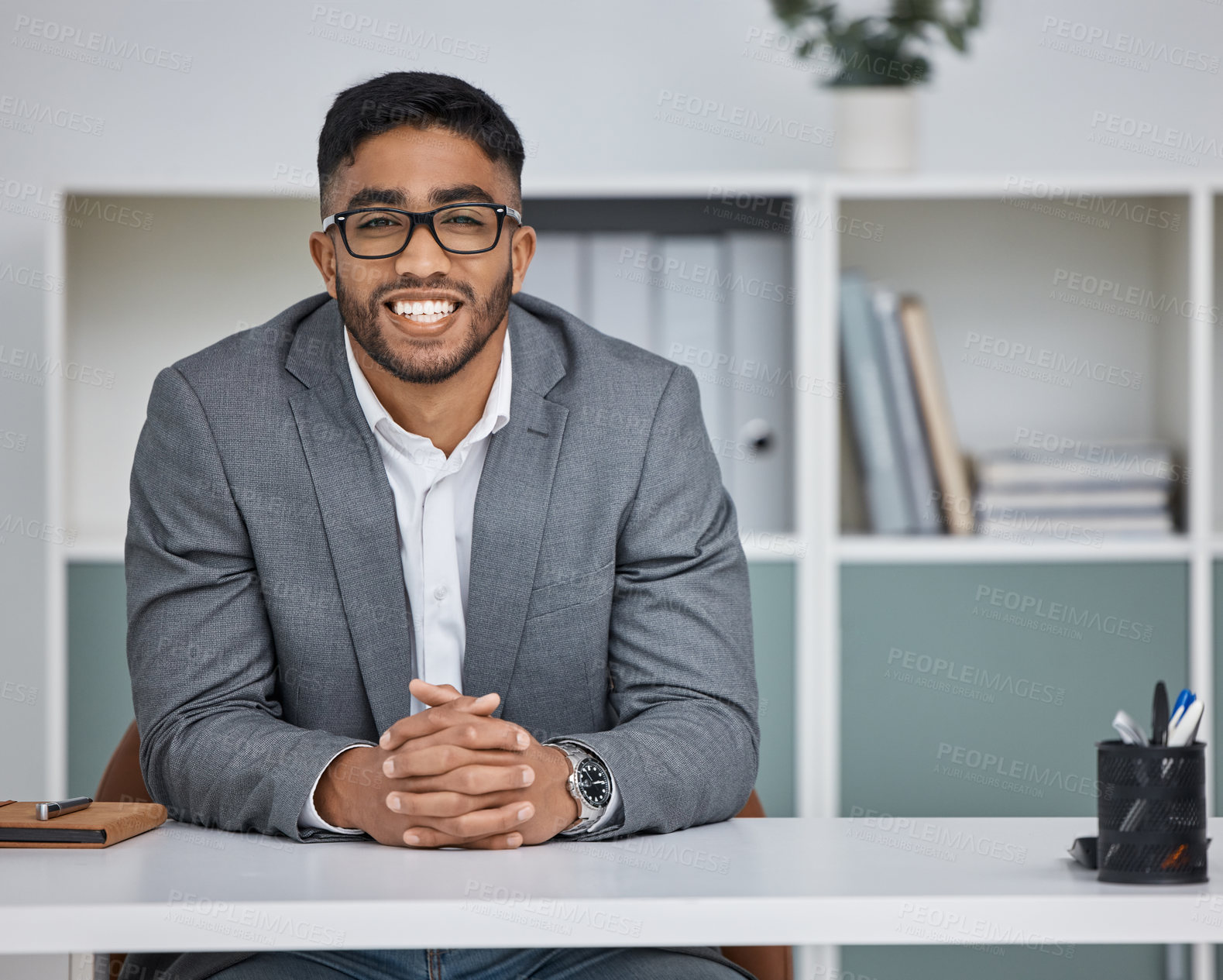 Buy stock photo Mexican man, portrait and employee at desk, smile and confident account at finance firm. Male person, glasses and proud of career opportunity or entrepreneur for startup company, business and job