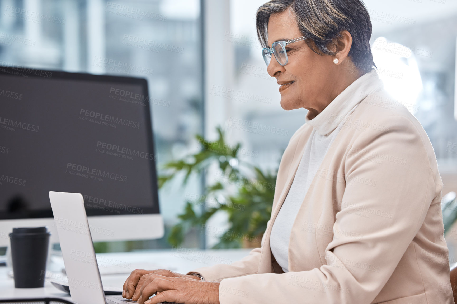 Buy stock photo Business woman, smile and typing on laptop for financial report, accounting and proposal. Happy, corporate executive on desk with office computer, audit deadline and planning for company finance