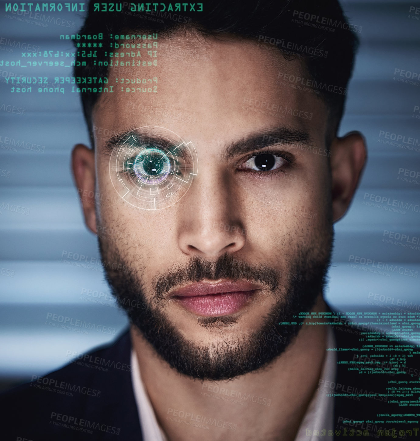 Buy stock photo Shot of a handsome young businessman working alone in the office at night