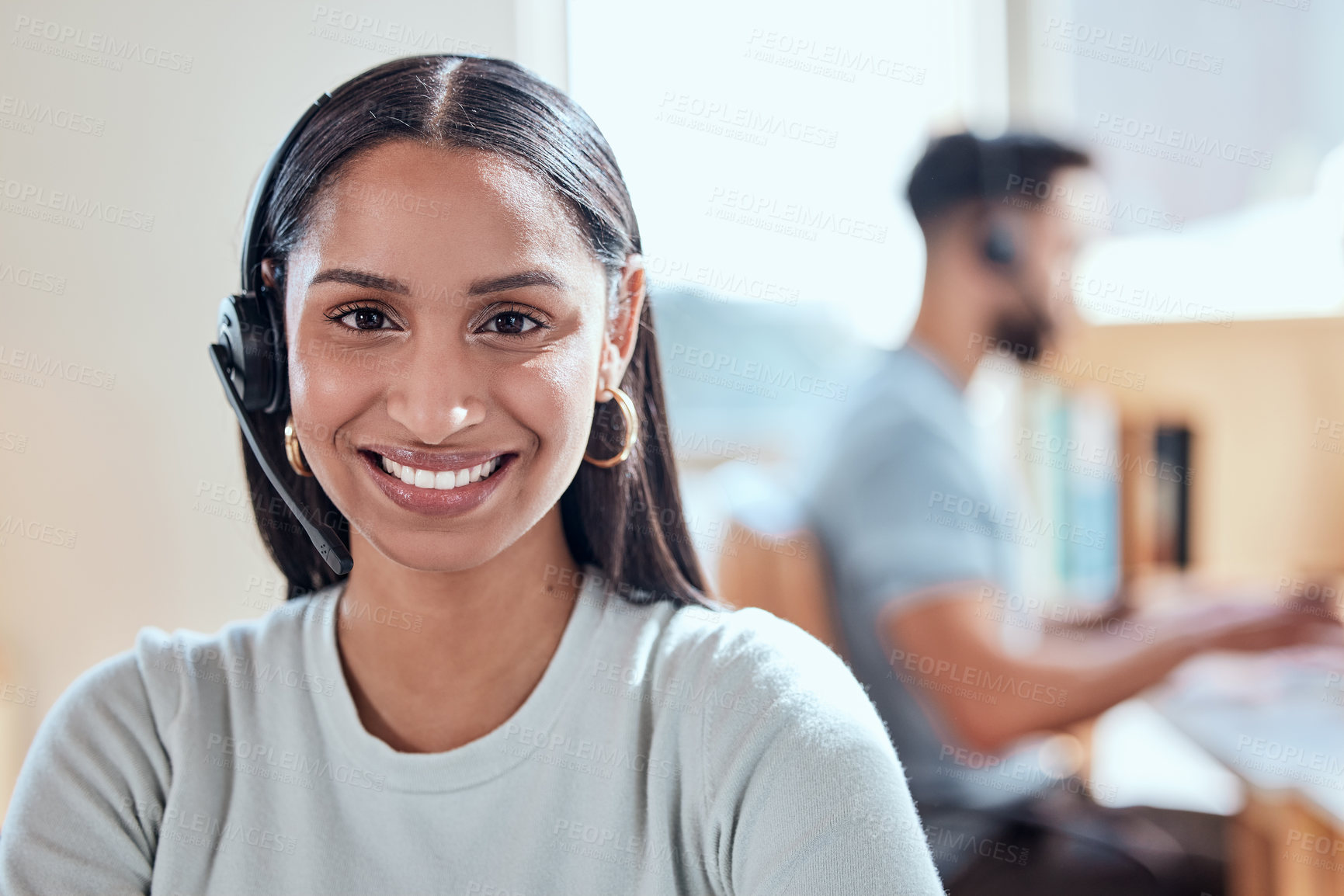 Buy stock photo Shot of a beautiful young woman working in a call center