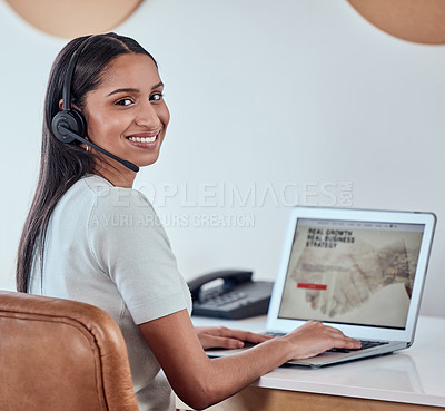 Buy stock photo Shot of a beautiful young woman working in a call center