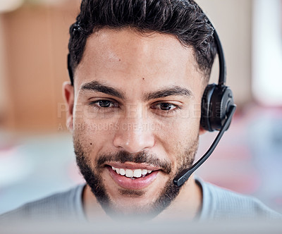 Buy stock photo Shot of a handsome young man working in a call center