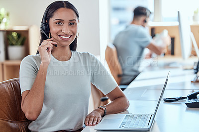 Buy stock photo Shot of a beautiful young woman working in a call center