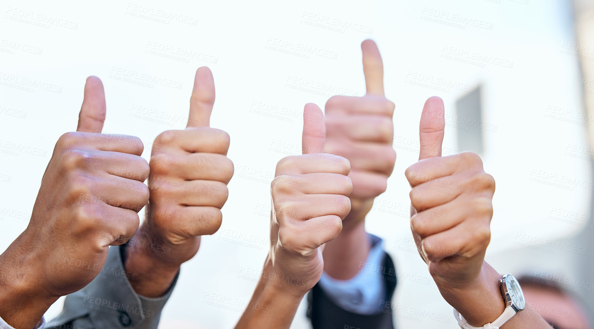 Buy stock photo Shot of a group of unrecognizable businesspeople showing a thumbs up