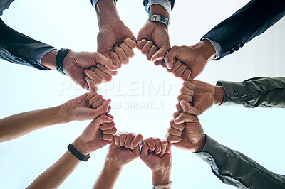Buy stock photo Fist, hands and business group outdoor with collaboration, teamwork and success sign. Below, team and solidarity of employee people with goal, target and workforce circle for support and motivation