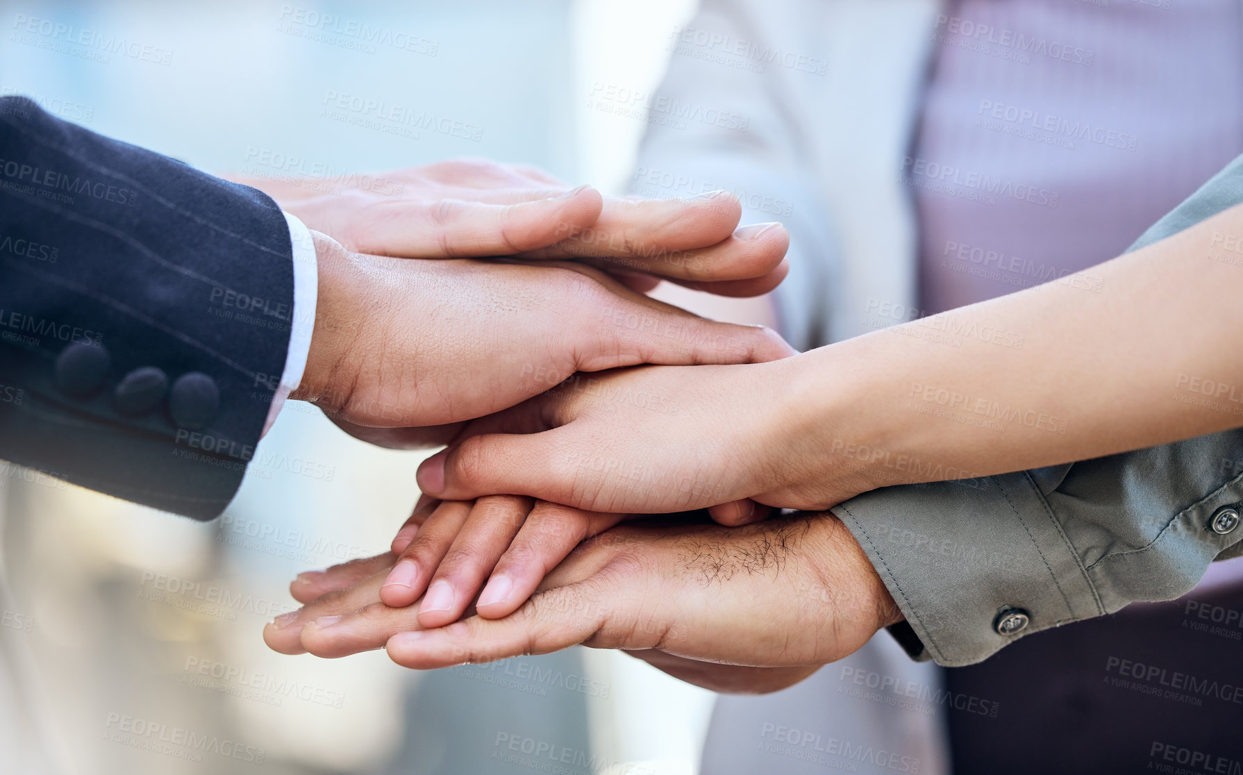 Buy stock photo Shot of a group of unrecognizable businesspeople stacking their hands