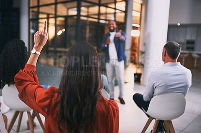 Buy stock photo Shot of an unrecognizable businessperson raising their hand to ask a question during a conference at work