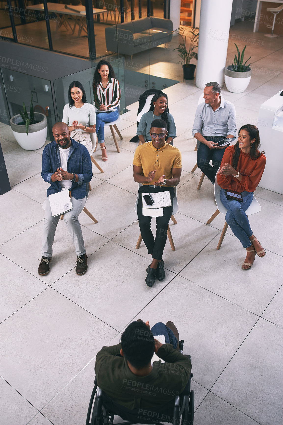 Buy stock photo Shot of a group of businesspeople attending a conference at work