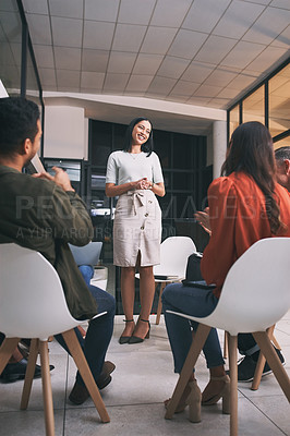 Buy stock photo Shot of a young businesswoman about to give a presentation