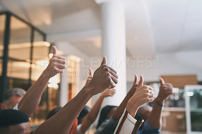 Buy stock photo Shot of a team of a group of unrecognizable colleagues giving the thumbs up