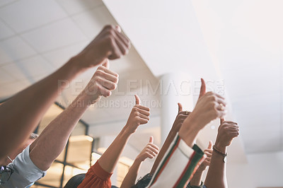 Buy stock photo Shot of a team of  a group of unrecognizable colleagues giving the thumbs up