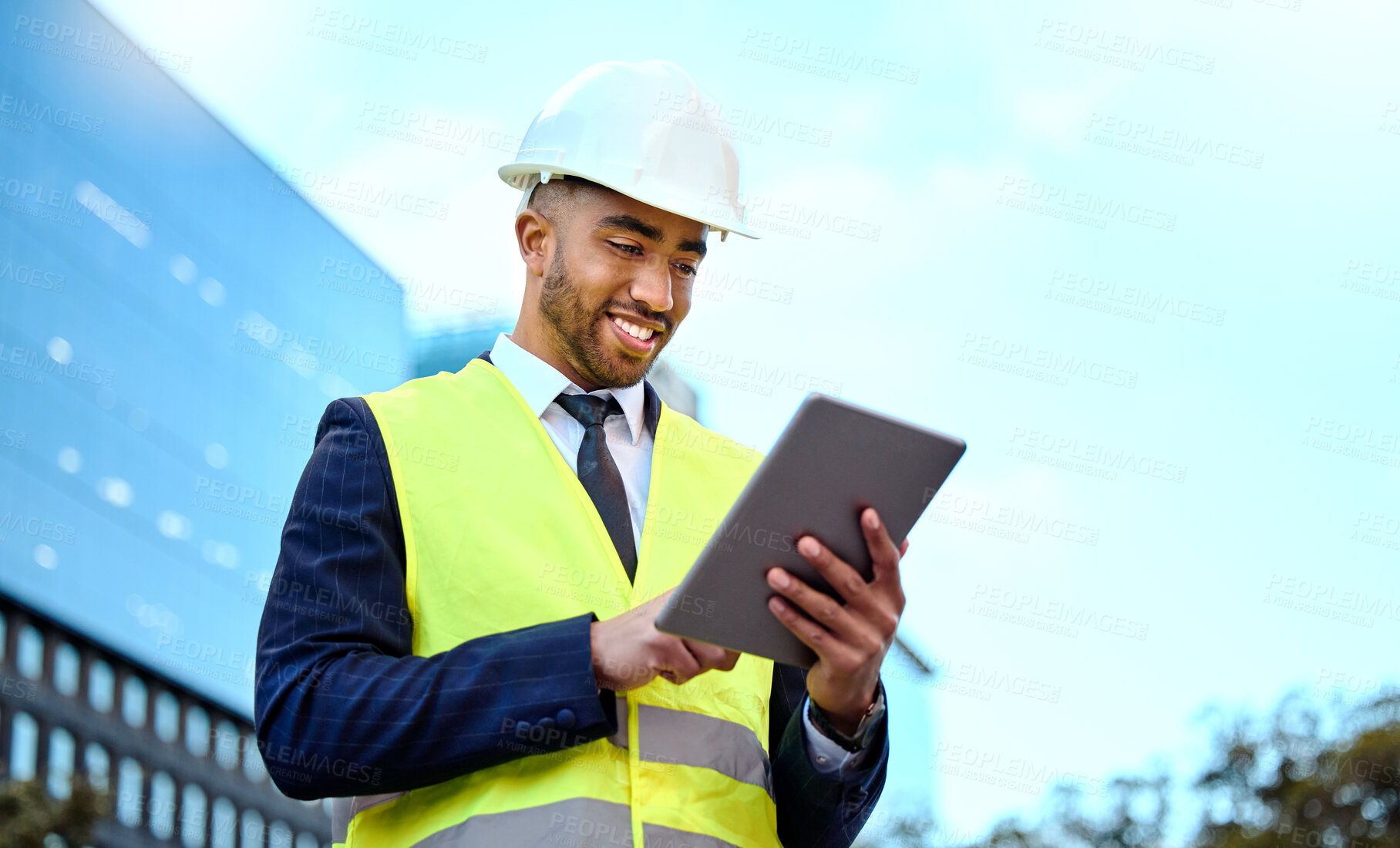 Buy stock photo Research, tablet and a man construction worker in a city for planning, building or architectural design. Blue sky, technology and a male architect online in an urban town during the creative process