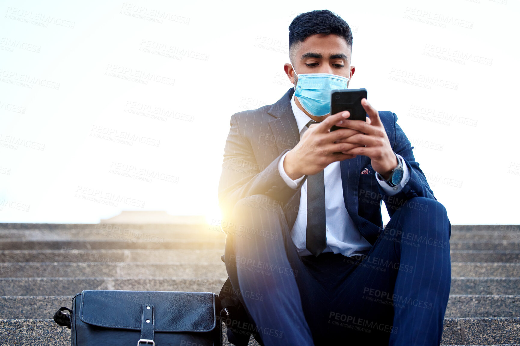 Buy stock photo Stairs, cellphone and business man with mask for virus, infection and illness protection outside. Law firm, building steps and lawyer with face cover or mobile for networking, chat and connection