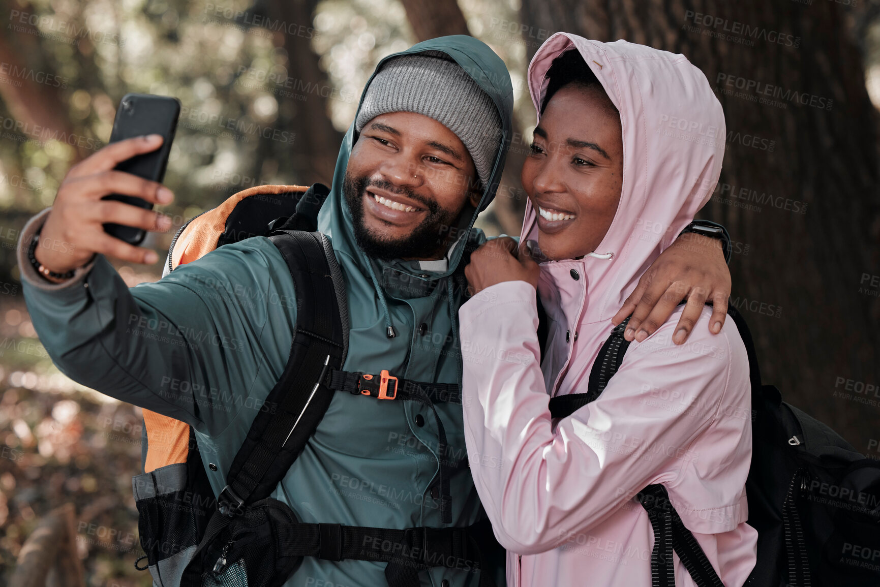 Buy stock photo Black couple, hiking and hug for selfie, profile picture or vlog in travel adventure together in nature. African man and woman hiker hugging for photo, memory or social media and trekking in forest