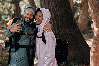 Buy stock photo Happy, black couple and hiking in hug for selfie, profile picture or vlog in travel adventure in nature. African man and woman hiker hugging for photo, memory or social media and trekking in forest