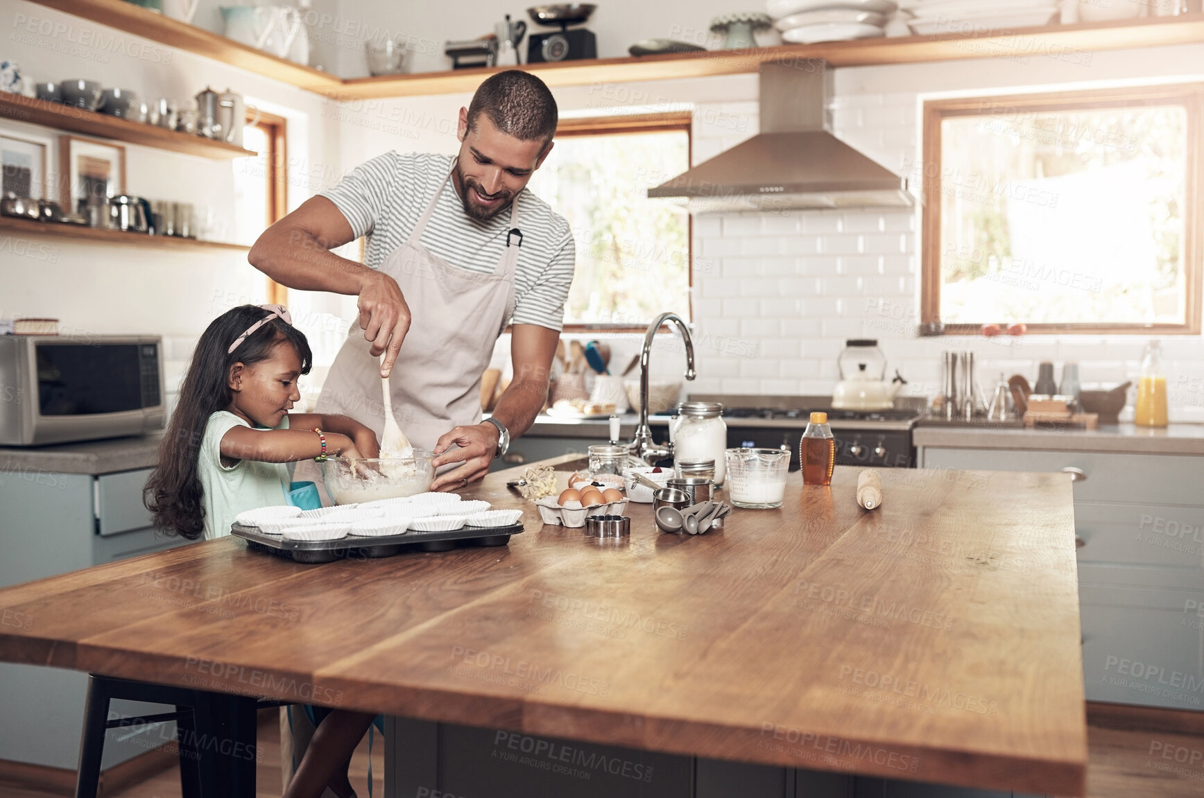 Buy stock photo Father, child and baking with together, skill or cooking for nutrition, education and growth. Male person, kid and teaching in youth development, support and bonding on kitchen counter in family home
