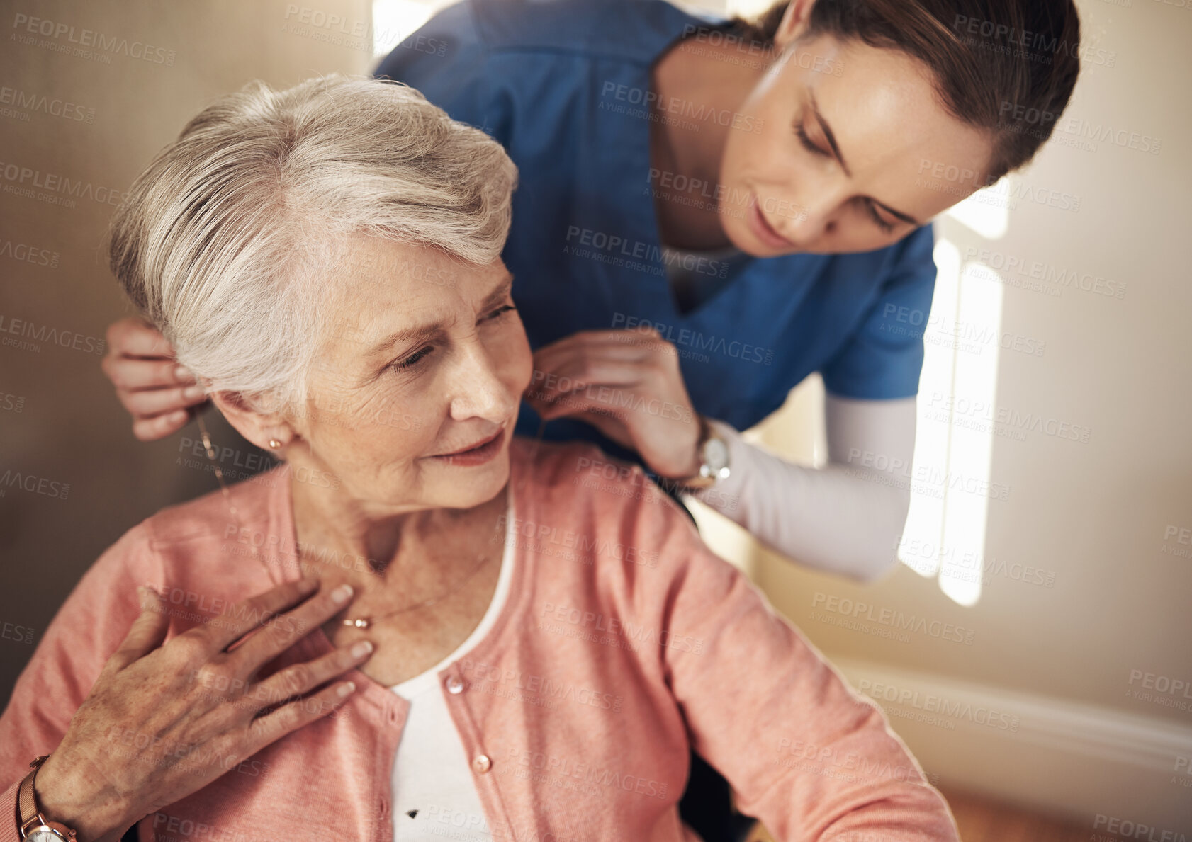 Buy stock photo Nurse, necklace and senior woman with help, assistance and jewelry, healthcare and employee. Old person, pensioner and medical with professional, aesthetic and appointment with happiness or caregiver