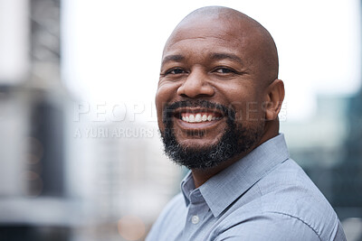 Buy stock photo Portrait of a confident mature businessman standing on a balcony outside an office