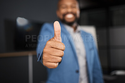 Buy stock photo Closeup shot of an unrecognisable businessman showing thumbs up in an office