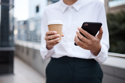Buy stock photo Closeup shot of an unrecognisable businesswoman using a cellphone while drinking coffee outside an office
