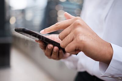 Buy stock photo Closeup shot of an unrecognisable businesswoman using a cellphone outside an office