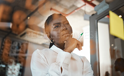 Buy stock photo Black woman, thinking and glass wall for ideas in office, brainstorming and sticky notes for solution. Female person, professional and board for contemplating sales, problem solving and planning