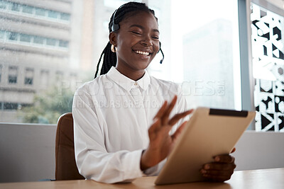 Buy stock photo Shot of a woman using a digital tablet while working in a call center