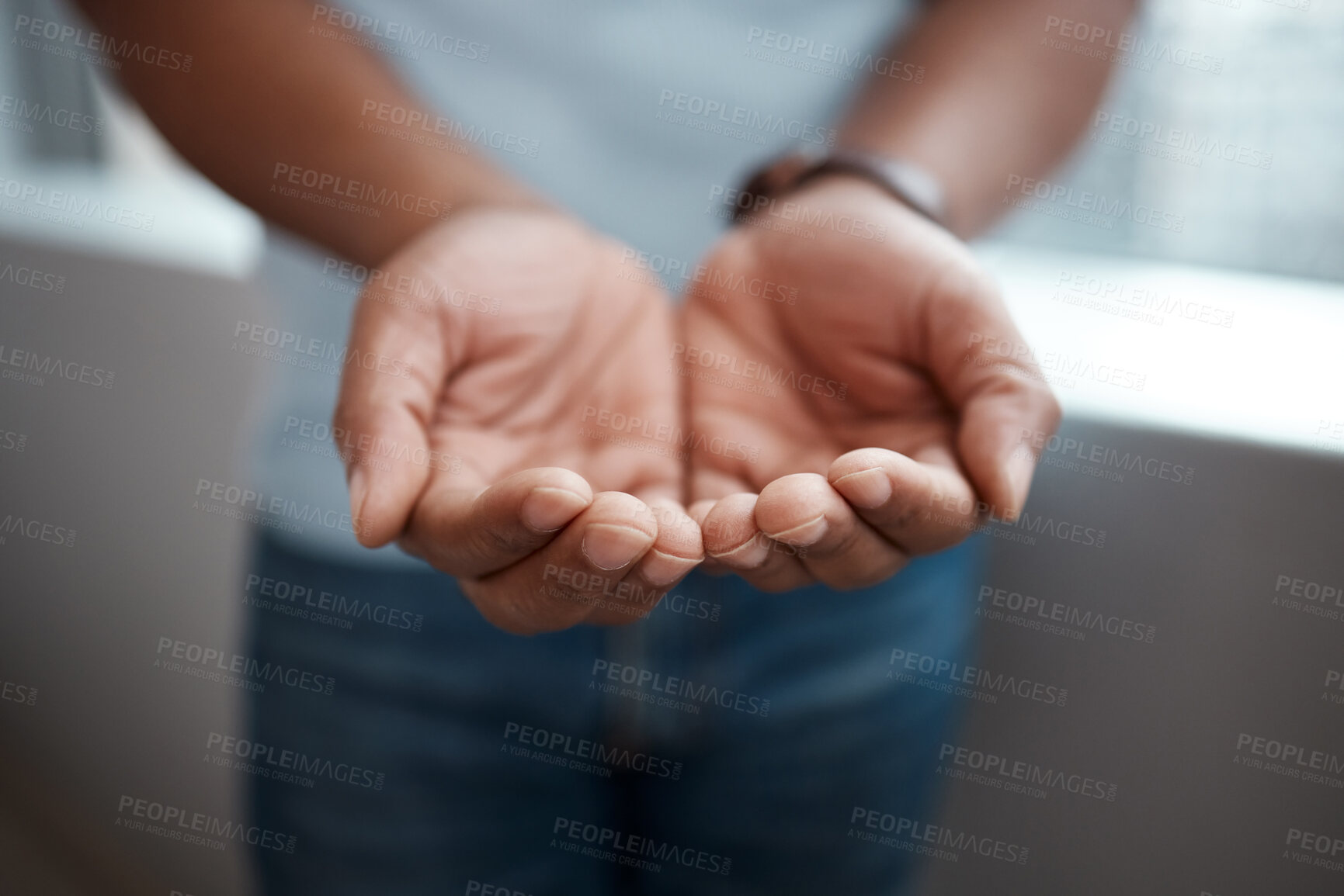 Buy stock photo Cropped shot of a businessman standing with his hands cupped together