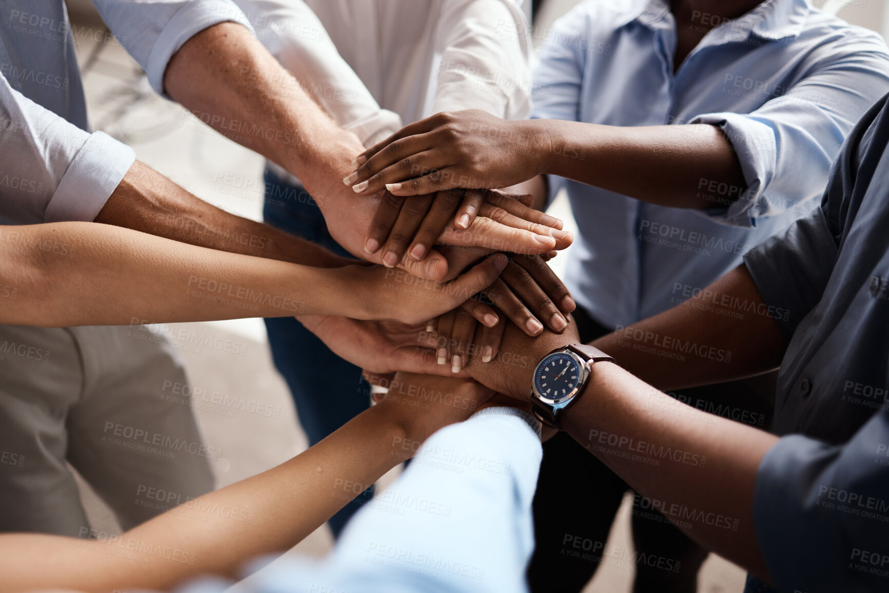 Buy stock photo Shot of a group of unrecognizable businesspeople stacking their hands at work