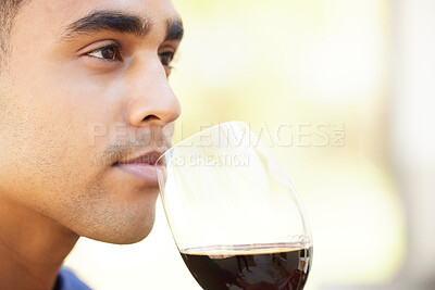 Buy stock photo Glass, smell and aroma with man for wine tasting, appreciate and farm and thinking of taste. Vineyard, organic and fermented fruit drink, winery and relaxing with Indian male person or outdoor