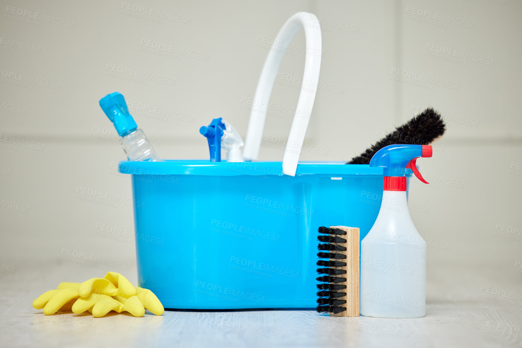 Buy stock photo Shot of an empty room with a bucket of cleaning supplies