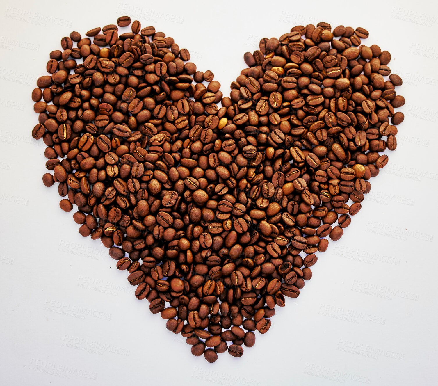 Buy stock photo Shot of coffee beans in a heart shape