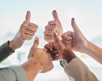 Buy stock photo Thumbs up, success or hands of business people with teamwork, motivation or diversity in a community. Thank you closeup,  approve or yes hand sign gesture of group of employees with thumb up together