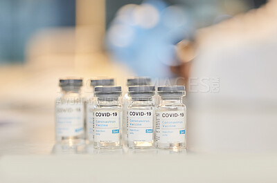 Buy stock photo Still life shot of vaccine tubes on a table in a hospital