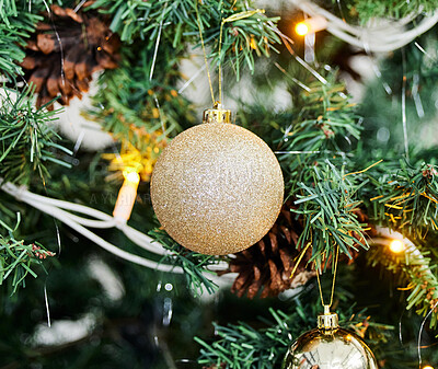 Buy stock photo Ball, glitter and lights with Christmas tree for decoration, festive or holiday season at home. Closeup of ornament, sparkle or hanging bauble for decor, December celebration or new year preparation