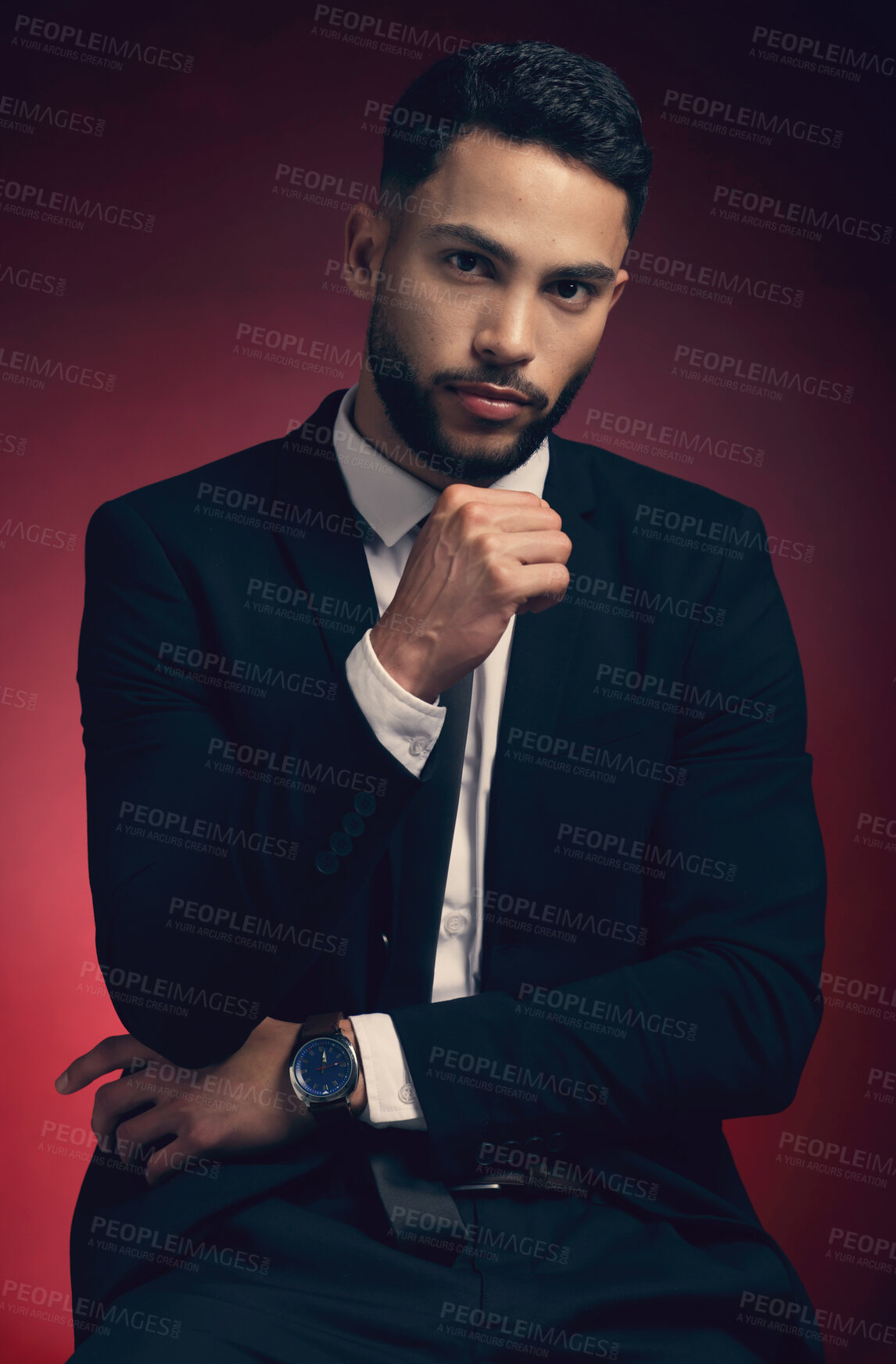 Buy stock photo Man, fashion and studio portrait with suit, confident and elegant tuxedo with businessman for professional attire. Luxury, formal clothes and classy outfit with blazer, isolated and red background