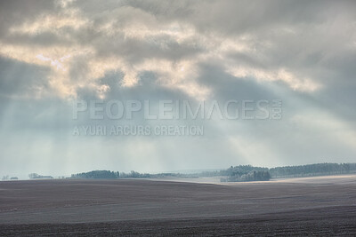 Buy stock photo A photo of a winter landscape at sunset