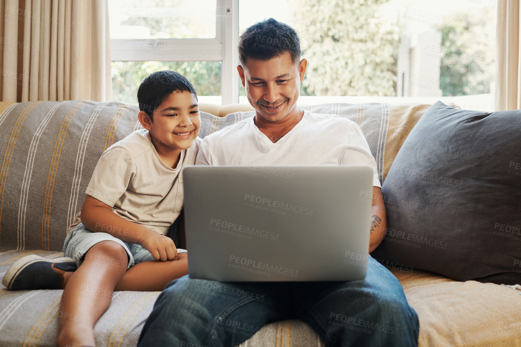 Buy stock photo Father, boy and relax with laptop on sofa for education or e learning for digital, english literature and ebooks for reading. Dad, child and technology for educational applications, help and home