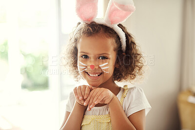 Buy stock photo Shot of a cute little girl acting like a bunny