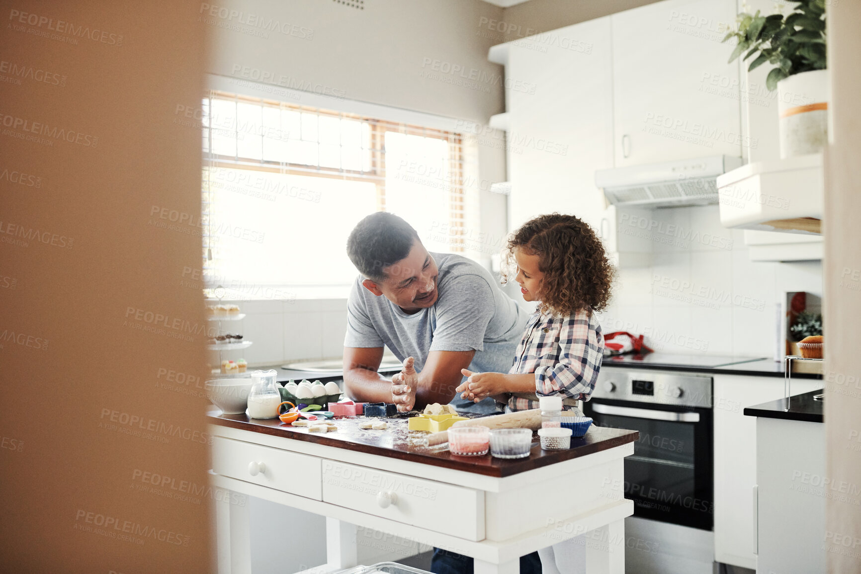 Buy stock photo Baking, father and girl in kitchen, care and teaching with support, ingredients and time together. Family, parent and dad with daughter in house, learning and cooking with utensils and conversation