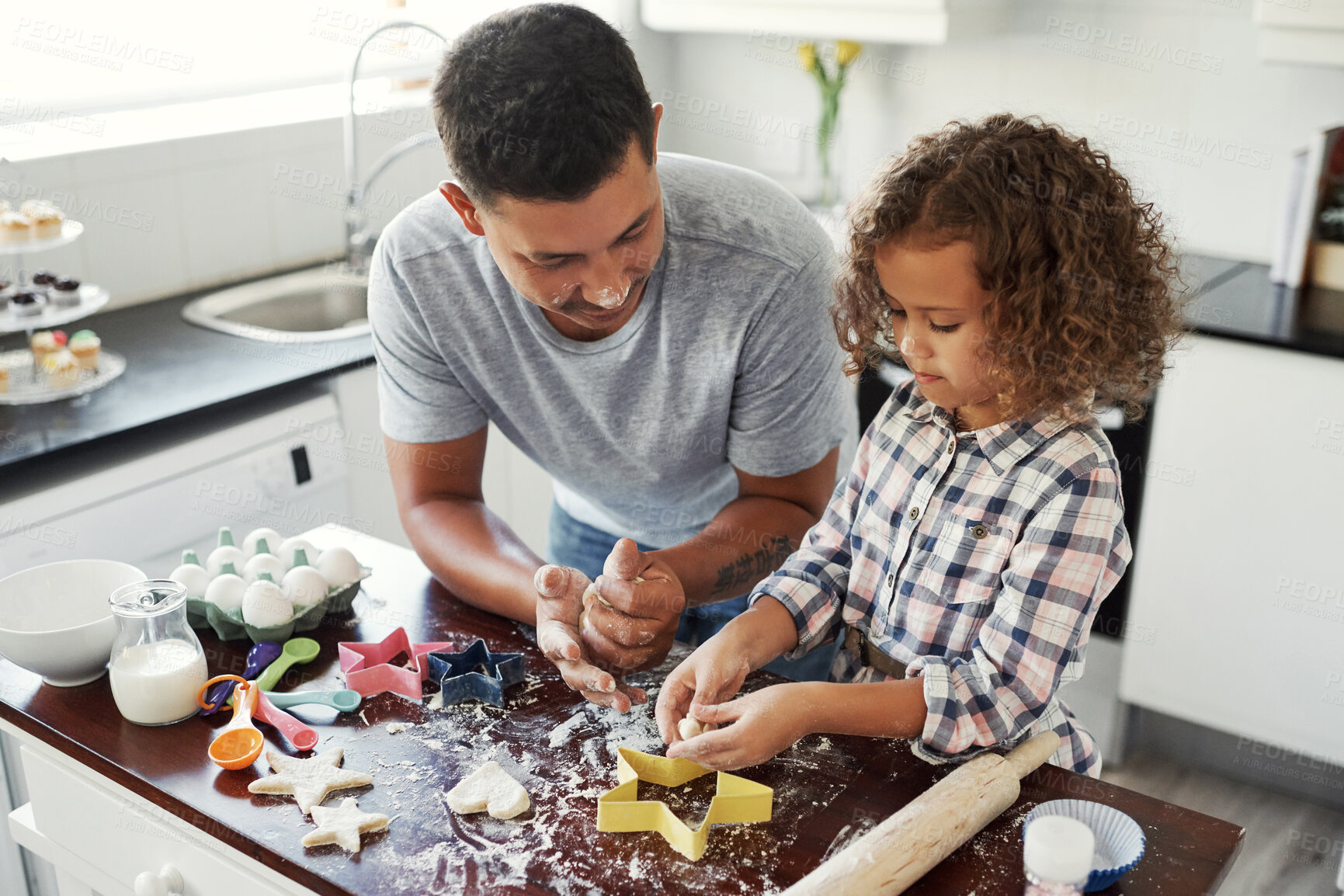 Buy stock photo Baking, dad and girl in kitchen, love and teaching with support, ingredients and time together. Happy family, parent or father with daughter in house, learning or dough with utensils or cookie cutter